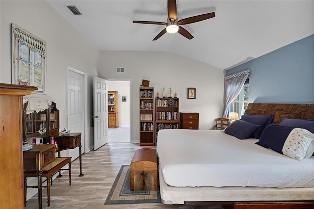 5500 Laver St, Leesburg, FL 34748 - bedroom featuring ceiling fan, lofted ceiling, light wood-style flooring, and visible vents