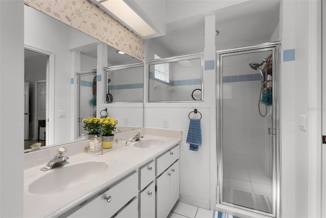 5500 Laver St, Leesburg, FL 34748 - bathroom with a sink, tile patterned floors, a stall shower, and double vanity