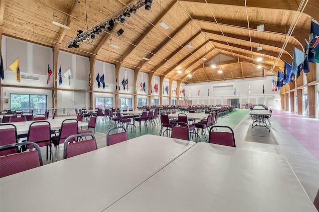 5500 Laver St, Leesburg, FL 34748 - dining room featuring beamed ceiling, high vaulted ceiling, wooden ceiling, and a wealth of natural light