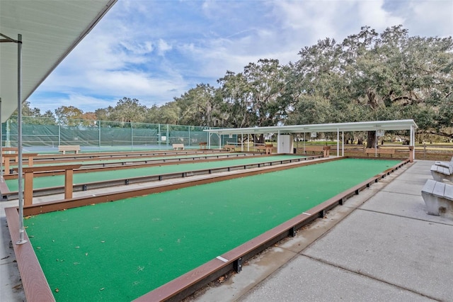 5500 Laver St, Leesburg, FL 34748 - view of home's community with fence and a tennis court