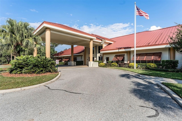5500 Laver St, Leesburg, FL 34748 - exterior space with stucco siding and metal roof