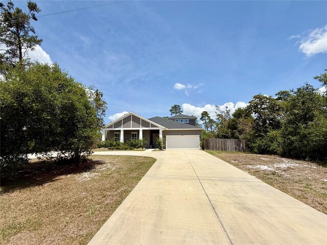 31857 Dahlia Ct, Eustis, FL 32736 - craftsman inspired home featuring driveway and an attached garage