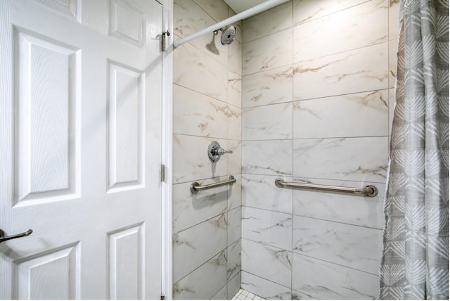 bathroom featuring a shower stall
