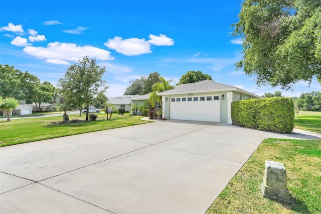 8709 Augusta Ct, Clermont, FL 34711 - view of side of property featuring concrete driveway, a lawn, stucco siding, and a garage