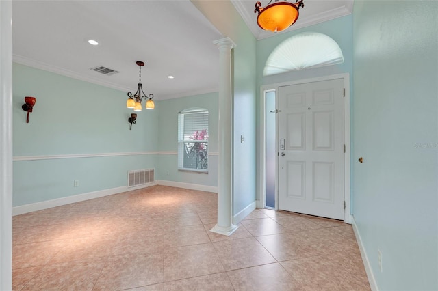 8709 Augusta Ct, Clermont, FL 34711 - foyer with baseboards, ornamental molding, decorative columns, and visible vents