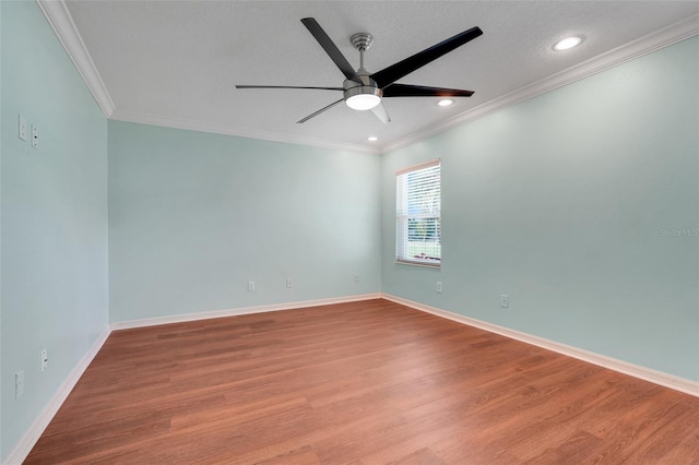 8709 Augusta Ct, Clermont, FL 34711 - spare room featuring baseboards, ceiling fan, ornamental molding, and wood finished floors