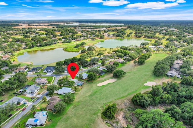 8709 Augusta Ct, Clermont, FL 34711 - bird's eye view with a residential view, view of golf course, and a water view