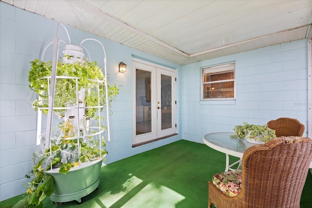 sunroom / solarium with french doors