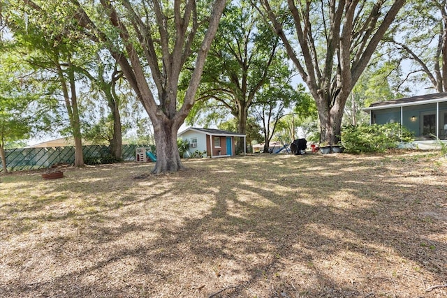 view of yard with fence