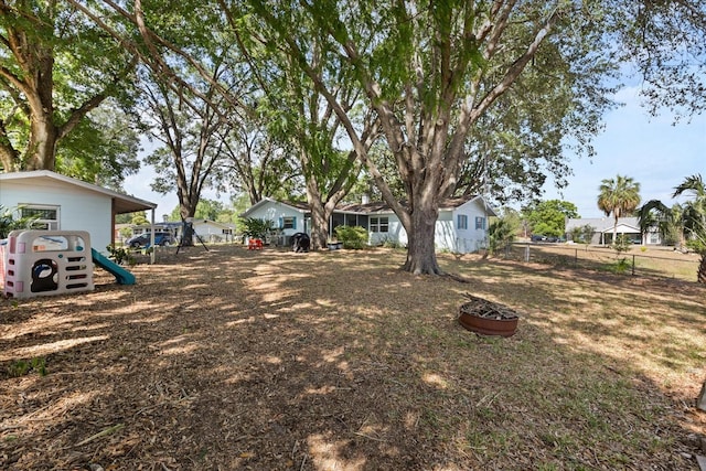view of yard with fence and a residential view