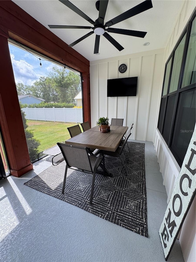 sunroom / solarium featuring healthy amount of natural light
