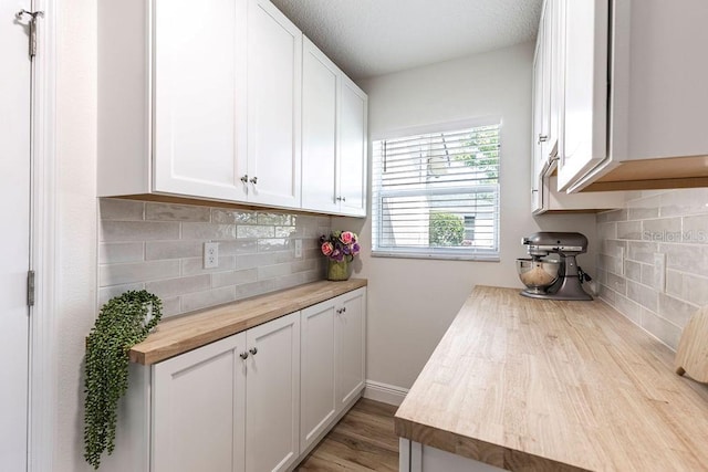 interior space with light wood-style floors and baseboards