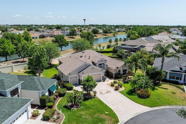 aerial view featuring a water view and a residential view
