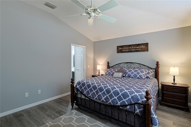 1451 Rosedale Way, The Villages, FL 32162 - bedroom featuring baseboards, wood finished floors, and lofted ceiling