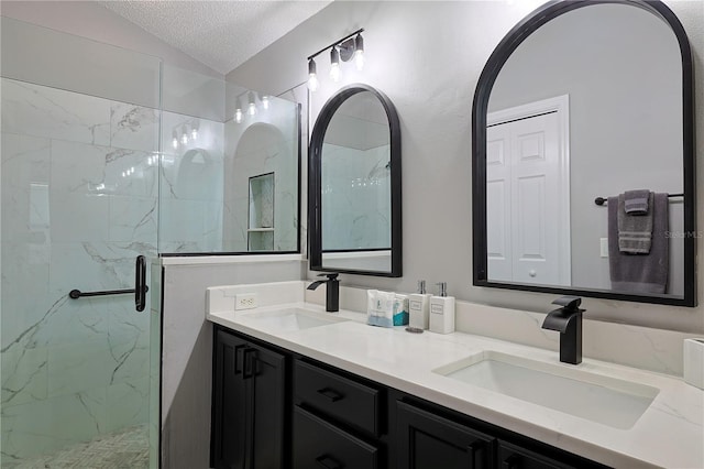 1451 Rosedale Way, The Villages, FL 32162 - bathroom featuring double vanity, a textured ceiling, a marble finish shower, and a sink