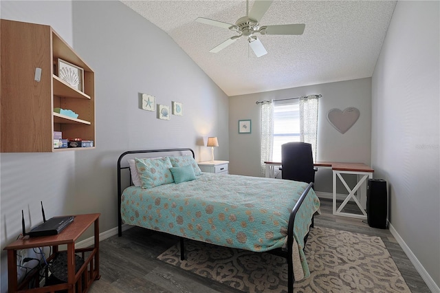 1451 Rosedale Way, The Villages, FL 32162 - bedroom with ceiling fan, a textured ceiling, vaulted ceiling, wood finished floors, and baseboards