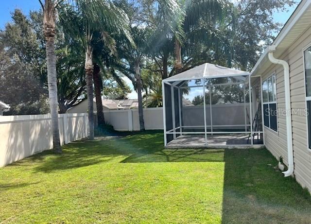 1451 Rosedale Way, The Villages, FL 32162 - view of yard featuring a fenced backyard