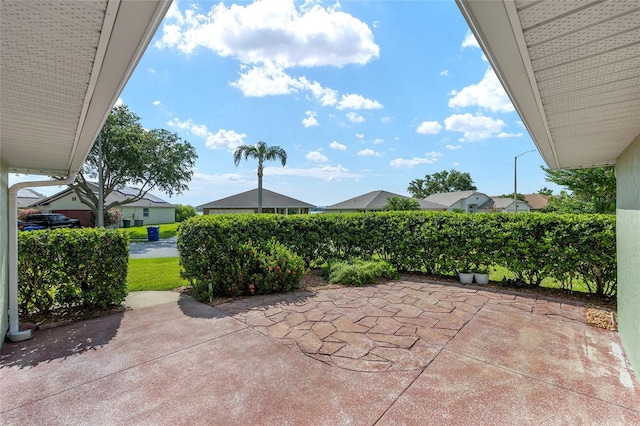 2750 Coral Reef Way, Tavares, FL 32778 - view of patio featuring a residential view