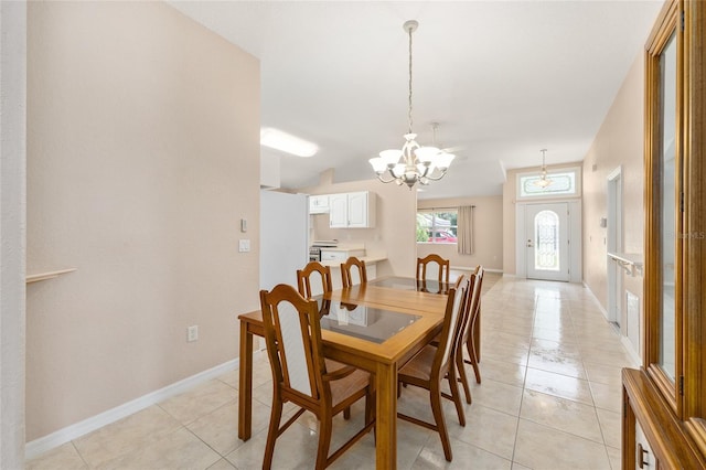 2750 Coral Reef Way, Tavares, FL 32778 - dining room with a chandelier and light tile patterned flooring