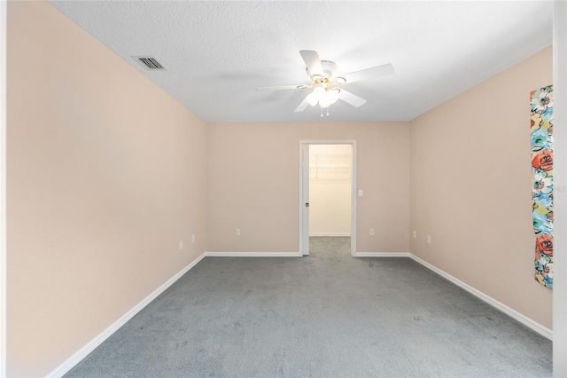 2750 Coral Reef Way, Tavares, FL 32778 - spare room featuring ceiling fan and carpet