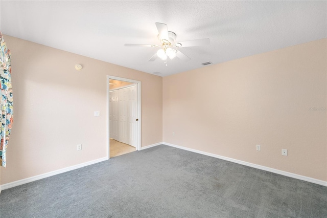2750 Coral Reef Way, Tavares, FL 32778 - carpeted spare room featuring a ceiling fan and a smoke detector