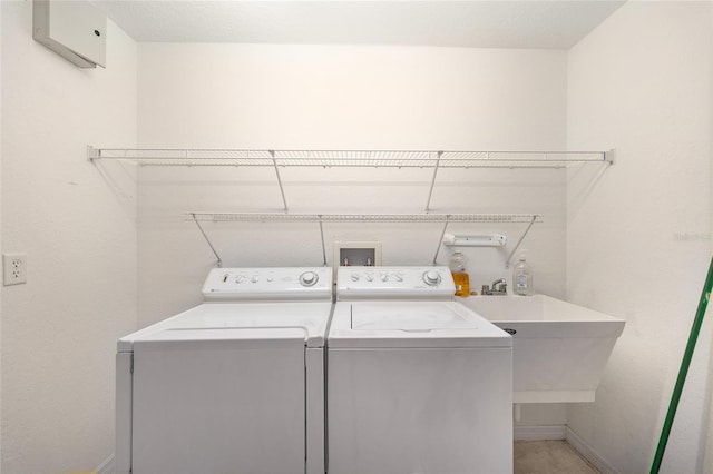 2750 Coral Reef Way, Tavares, FL 32778 - laundry area featuring independent washer and dryer and baseboards