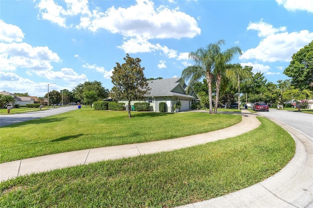 2750 Coral Reef Way, Tavares, FL 32778 - view of front of property with a front lawn