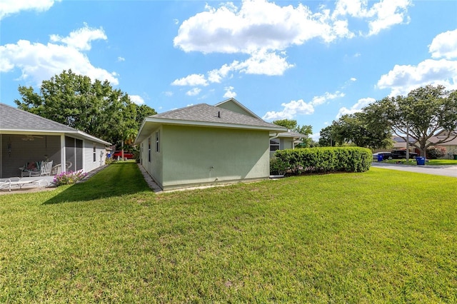 2750 Coral Reef Way, Tavares, FL 32778 - view of side of property featuring a yard and stucco siding