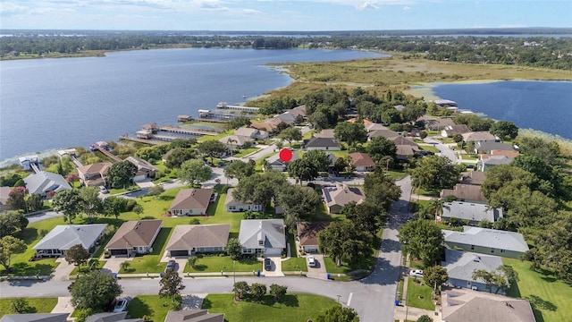 2750 Coral Reef Way, Tavares, FL 32778 - aerial perspective of suburban area featuring a nearby body of water