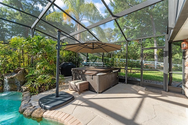 exterior space featuring a hot tub, a lanai, an outdoor pool, and a grill