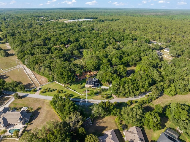 aerial view featuring a forest view