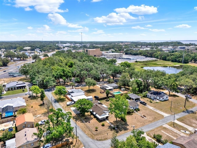 506 Richard St, Leesburg, FL 34748 - drone / aerial view of a large body of water and a tree filled landscape