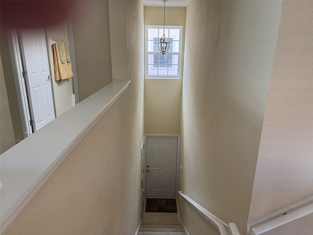 1288 Grady Ln, Davenport, FL 33896 - stairs with a chandelier