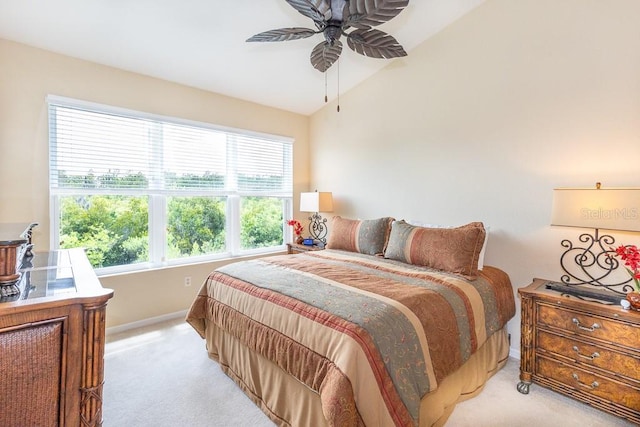 1288 Grady Ln, Davenport, FL 33896 - bedroom with light colored carpet, lofted ceiling, and a ceiling fan