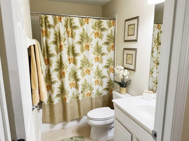 1288 Grady Ln, Davenport, FL 33896 - bathroom featuring vanity, curtained shower, a textured wall, and tile patterned floors