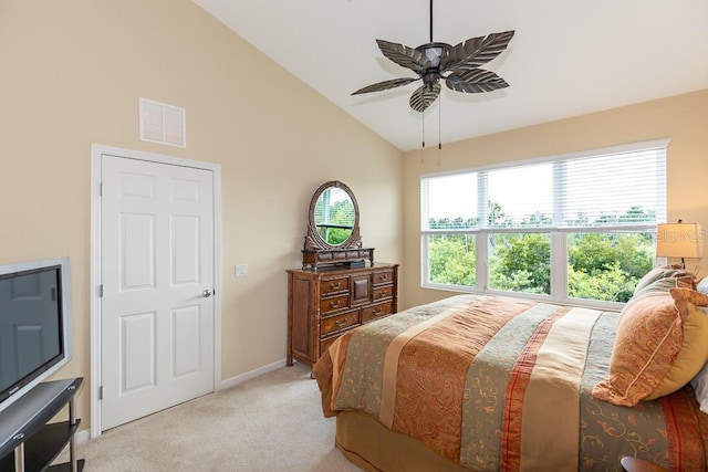 1288 Grady Ln, Davenport, FL 33896 - bedroom with light colored carpet, ceiling fan, and high vaulted ceiling