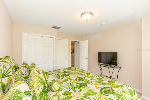 1288 Grady Ln, Davenport, FL 33896 - bedroom featuring carpet flooring and a closet