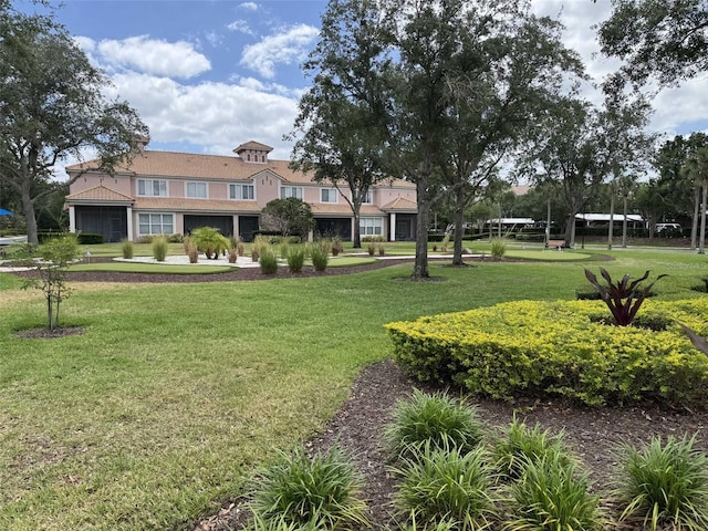 1288 Grady Ln, Davenport, FL 33896 - view of property's community featuring a lawn