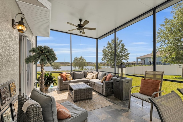 3441 Landing Vw, Tavares, FL 32778 - sunroom with a water view, a ceiling fan, and an outdoor hangout area