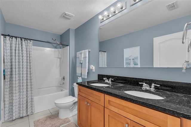 3441 Landing Vw, Tavares, FL 32778 - bathroom featuring toilet, tile patterned flooring, shower / bath combo, double vanity, and a textured ceiling