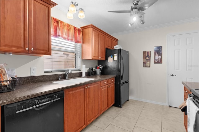 kitchen with a sink, dark countertops, ceiling fan, and black appliances