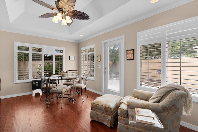 dining space with dark wood-type flooring and baseboards