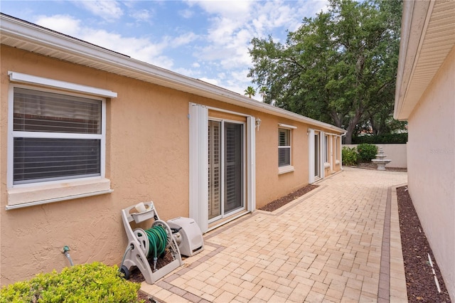 view of patio featuring fence