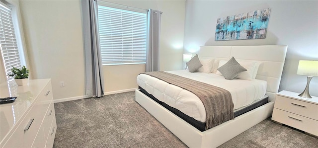 817 Ocean Course Ave Unit 502, Davenport, FL 33896 - bedroom featuring carpet floors and baseboards