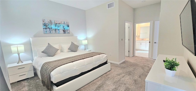 817 Ocean Course Ave Unit 502, Davenport, FL 33896 - carpeted bedroom with baseboards and connected bathroom