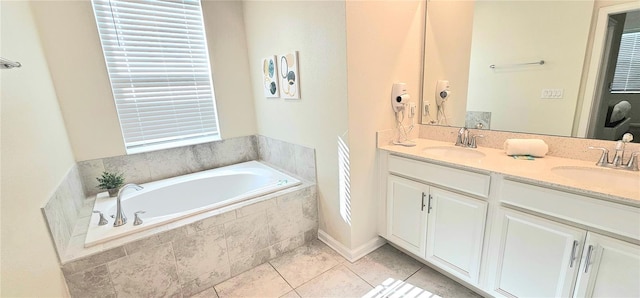 817 Ocean Course Ave Unit 502, Davenport, FL 33896 - bathroom featuring a bath, tile patterned flooring, double vanity, and plenty of natural light
