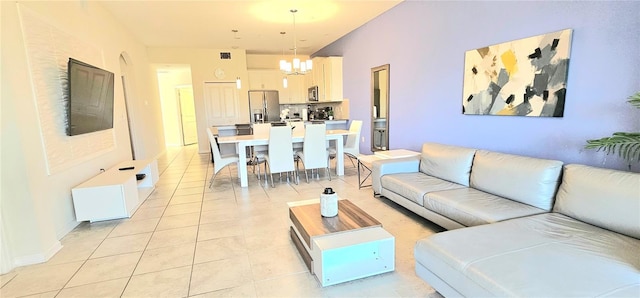817 Ocean Course Ave Unit 502, Davenport, FL 33896 - living area with a chandelier and light tile patterned floors