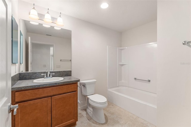 9181 SE 166th Sprung Ln, The Villages, FL 32162 - full bathroom with toilet, shower / washtub combination, tile patterned floors, visible vents, and vanity