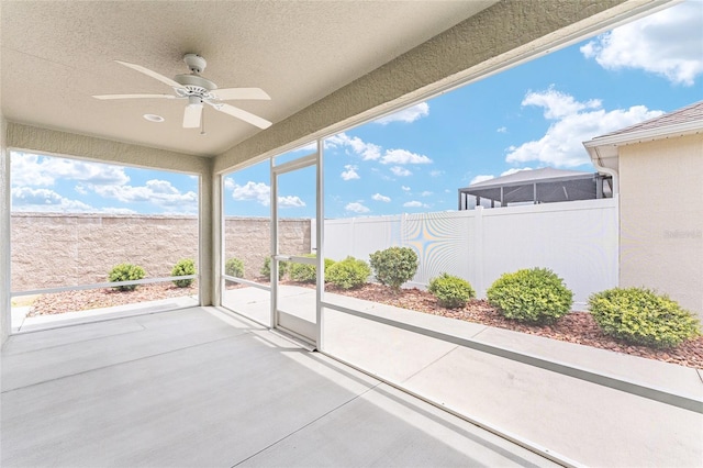9181 SE 166th Sprung Ln, The Villages, FL 32162 - view of patio featuring a ceiling fan and fence