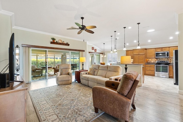 1182 Allaire Loop, The Villages, FL 32163 - living area with crown molding, a ceiling fan, light wood-type flooring, vaulted ceiling, and recessed lighting